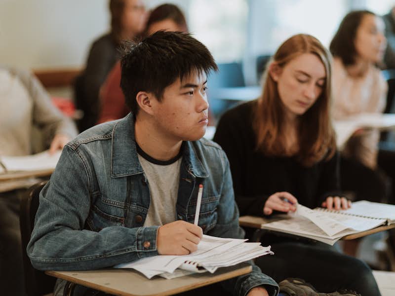 Students taking notes in class