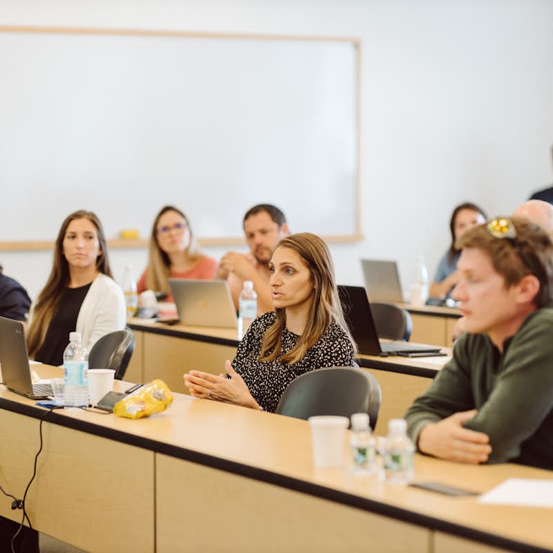 Graduate students sitting in class