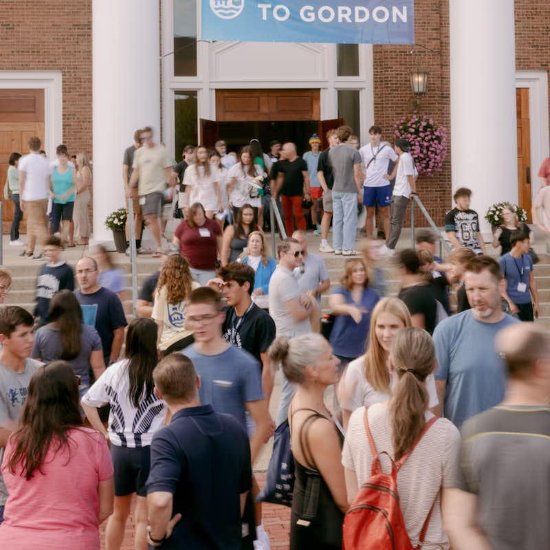 Crowd of students and families outside the chapel during Orientation