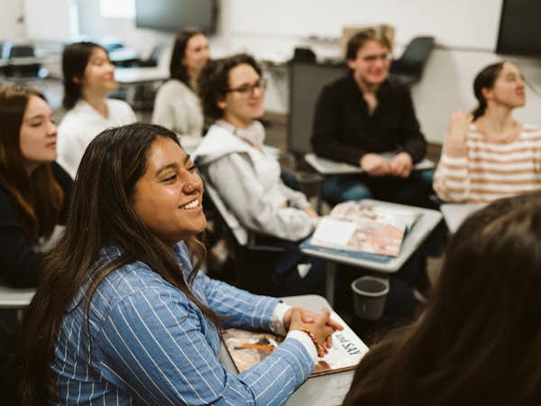 Students listen attentively during an interactive class