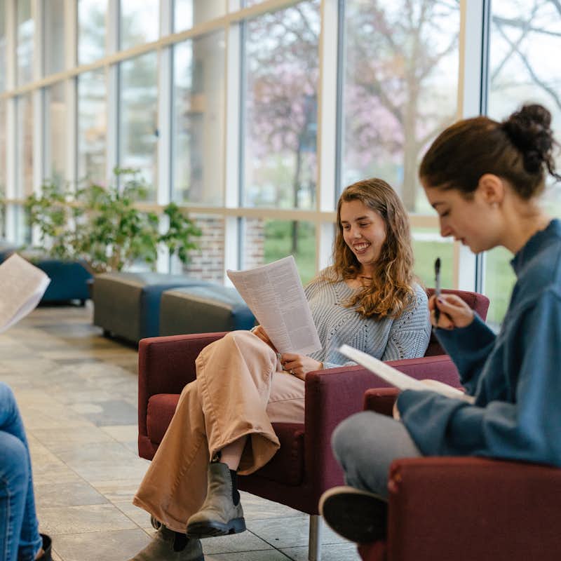 Students read in a circle during a class