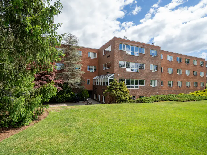 Exterior of Ferrin, a brick building with four floors of undergraduate housing.
