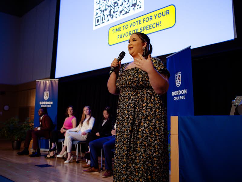 A student gives a presentation at Gordon's annual JUD Talks
