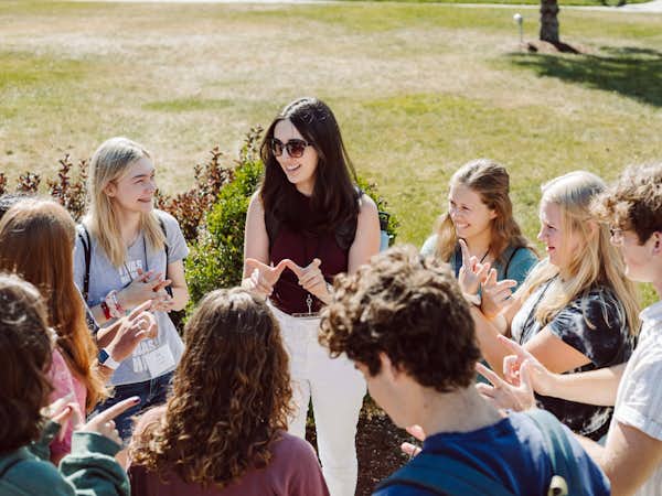 Students in high school program learning outside
