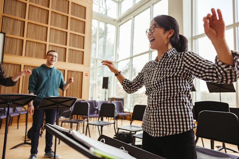 Gordon College professor teaches students to conduct.
