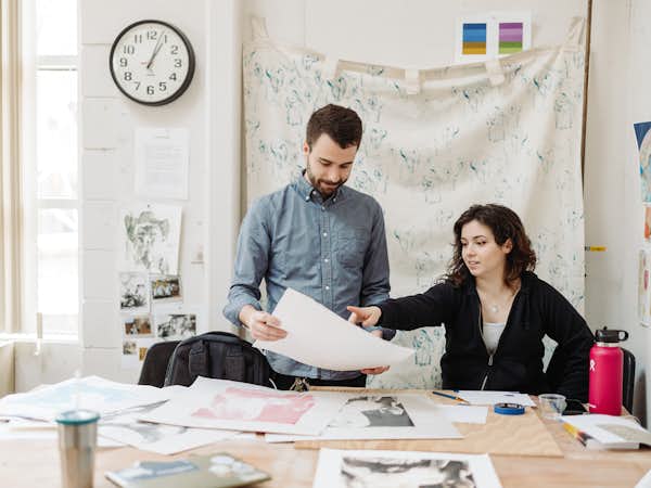 Gordon College student majoring in art discusses her work with her professor