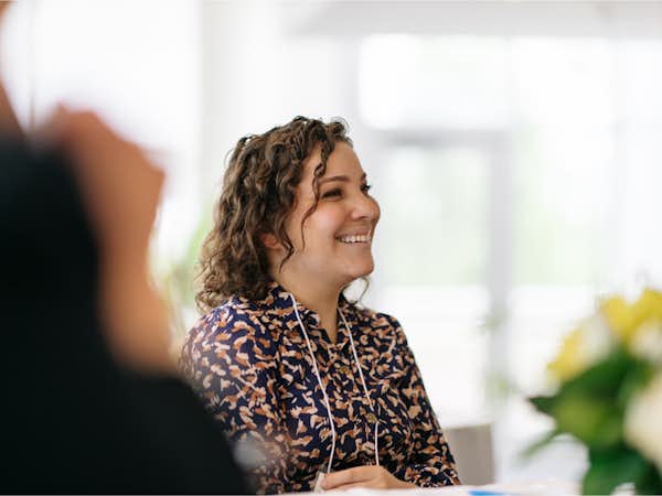 Graduate student listens to a lecturer